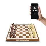 Chessnut Air Electronic Chess Board - A magnificent handcrafted wooden set with extra queens, LED, game and adaptive electronic chess apps. For 2 players, ages 10 and up.