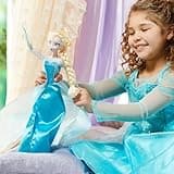 Disney Store Official Elsa Singing Doll, Frozen, 41cm/16”, Lights up and Sings Let it Go, Kids Toy in Shimmering Blue Gown with Articulated Arms and Legs